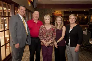 Fergerson (second from left), a mother of four and stepmother of two, is currently studying speech-language pathology thanks in part to a scholarship.
