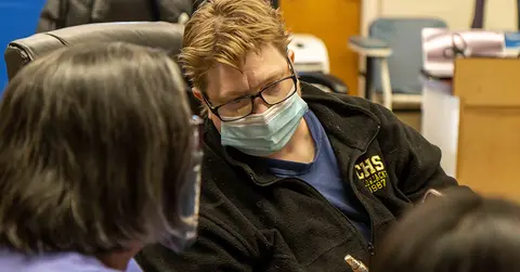 people working at the free clinic at TTUHSC, providing telemedicine for people in need