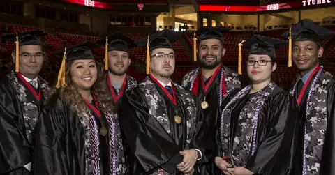 Veteran students standing in a line
