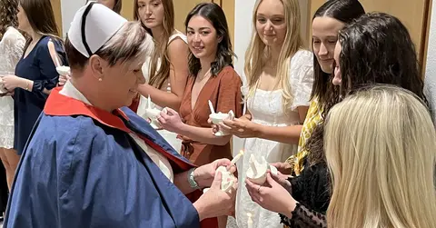 students stand in line for TTUHSC School of Nursing's lamp lighting ceremony