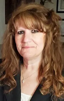 Woman nursing dean's headshot
