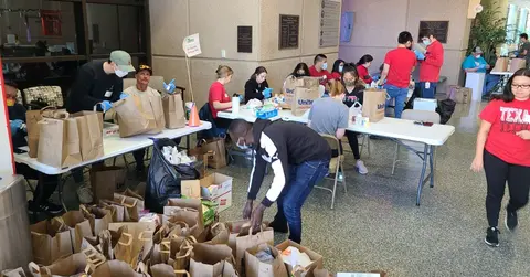 lubbock fall medication cleanout volunteers and bags of dropped-off medication