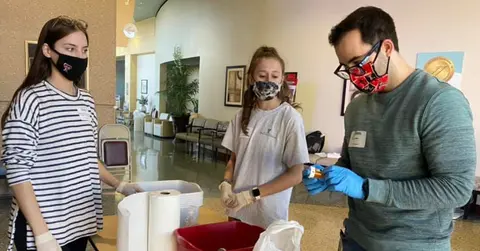 Participants helping at the Lubbock Medication Cleanout