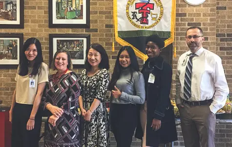 Mint and Juelie with TTUHSC Abilene faculty and students