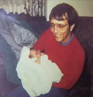 Prien holding the first baby born from IVF in Lubbock
