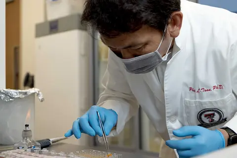 Dr. Tran, Ph.D. researching selenium