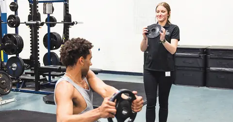 TTUHSC Athletic Trainer as a Health Care Provider, working with a patient.