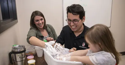 Melissa Whitaker uses hands on learning to engage with student and child