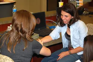 Campers practice taking pulse rates during the Raider Red Pharmacy Summer Camp in Abilene.