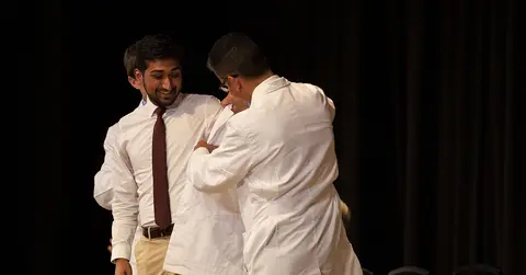Student receives white coat