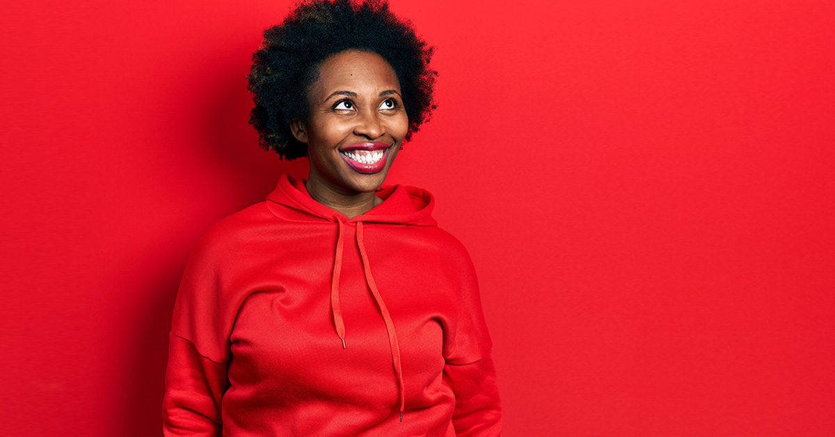 Young woman in red sweatshirt